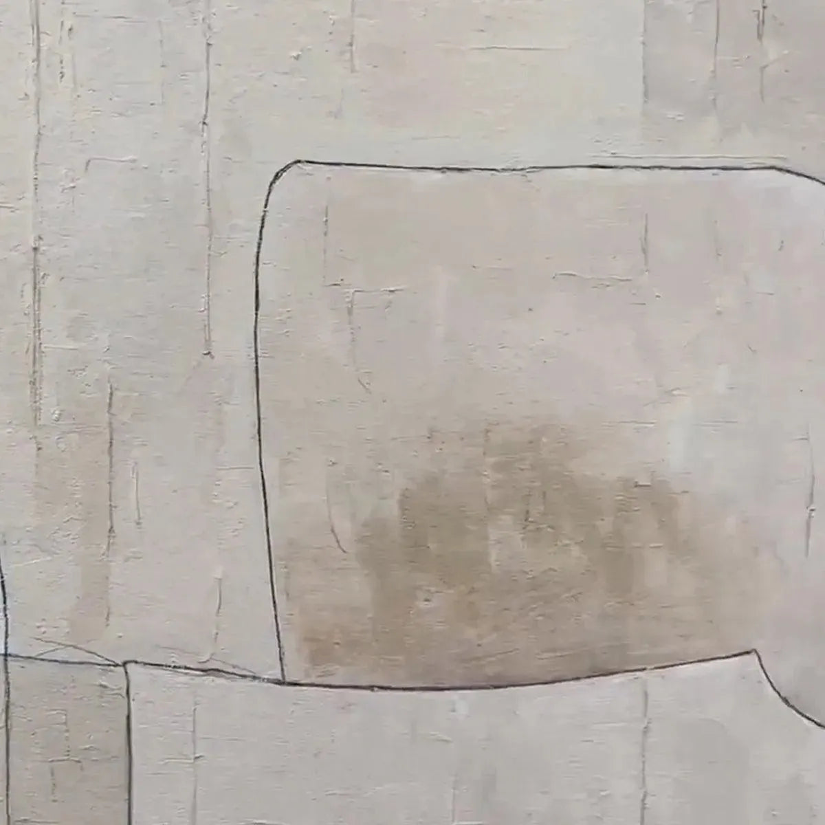 Close-up of Javier Ramirez's abstract painting, showing beige and black geometric shapes with textured brushstrokes.